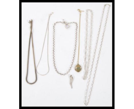 A selection of silver necklaces to include two snake chains, a belcher link chain with a toggle clasp, a gold on silver locke