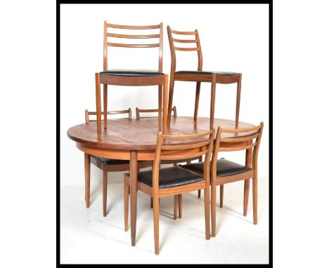 A&nbsp; retro 20th Century G-Plan Fresco range extendable teak wood dining table together with a set of six vintage retro 20t