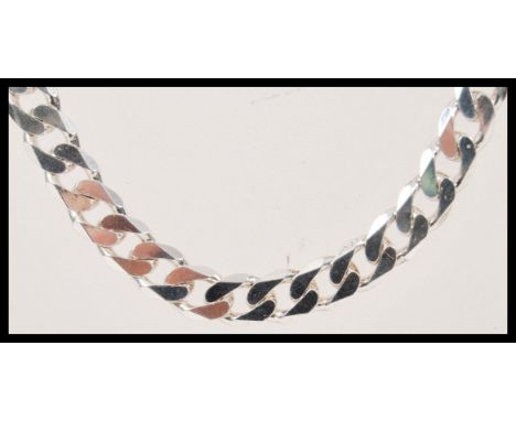 A stamped 925 silver flat link necklace chain having a lobster clasp. Weight 61.6g. Measures 22 inches long.