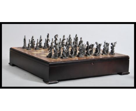 A Myth and Magic Lord of the Rings inspired large chess set and board entitled The Battle of the Dragons and the Unicorns com