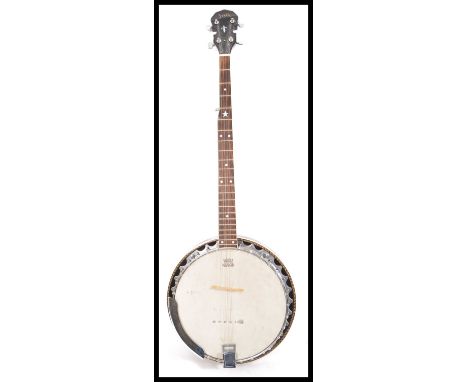 A vintage retro 20th Century Weatherking Remo 5 string banjo musical instrument. Measures 93cm high x 34cm width.