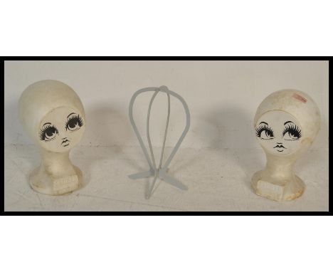 A vintage retro 20th Century group of haberdashery shop display items to include two polystyrene Carmen Polo signature busts 