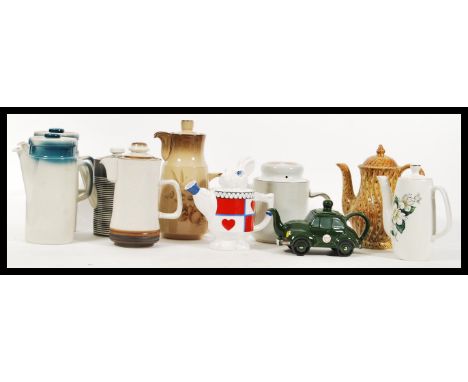 A collection of 20th Century vintage and novelty tea and coffee pots to include two Wedgwood blue pacific coffee pots, a T G 