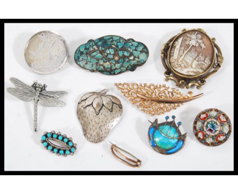 A collection of vintage 20th Century brooches to include a micro mosaic, cameo carved,silver, silver hallmarked enamel exampl