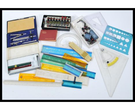 A collection of vintage engineers drawing tools to include a boxed Rotring variant pen with spare parts, a faber Castell pen,