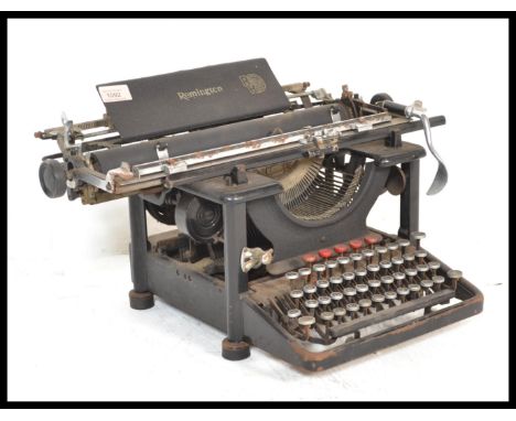 A vintage retro 20th Century industrial Remington Rand USA American made typewriter.
