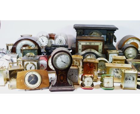 A collection of mantel clocks, circa 1950s-80s, having manual wind and quartz movements. (4) 