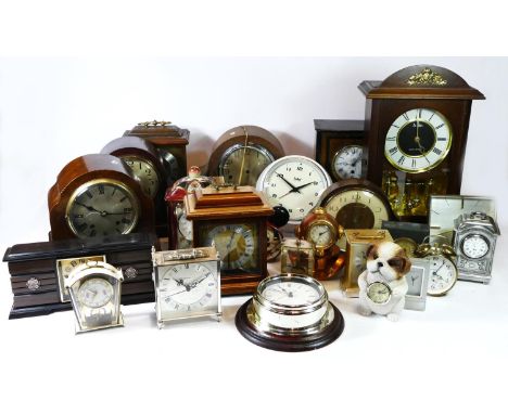 A collection of early 20th century and later mantel clocks, having manual wind and later quartz movements. (4) 