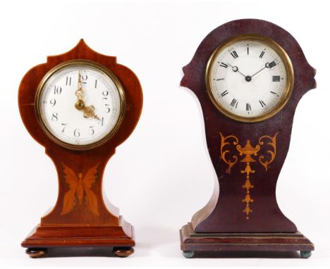 An Edwardian inlaid balloon shaped mantel clock, having butterfly marquetry decoration, with enamelled dial and gilt scroll h