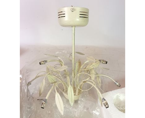A pendant ceiling light, consisting of nine floral shades 