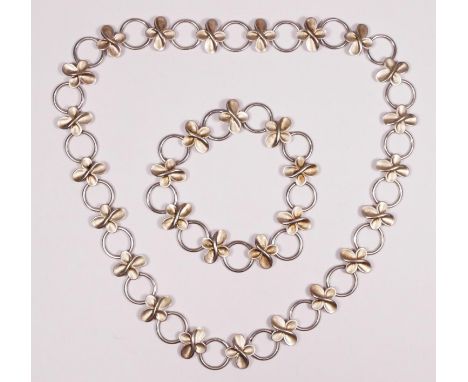 A silver floral panel link necklace, 42cm and a matching bracelet 17.5cm, 58gm 