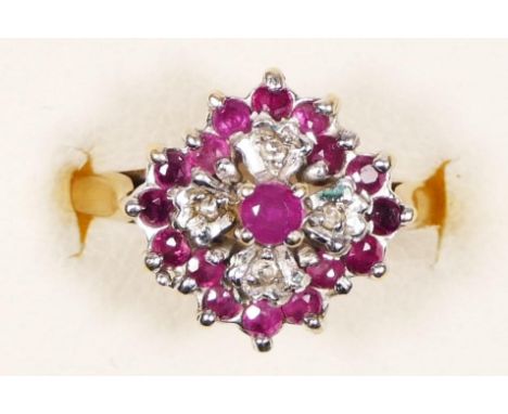 A 9ct gold ruby and diamond cluster ring, K, 2.6gm 