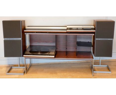 A Bang & Olufsen sound system to include a Beomaster 2400-2 amplifier with built in tuner, a Beocord 2400 cassette deck and a