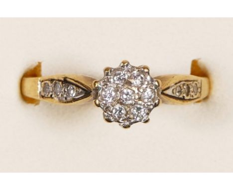 A 9ct gold and brilliant cut diamond cluster ring, stated weight 0.20cts, R, 2.7gm 