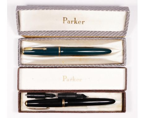 A Parker Maxima Duofold black fountain pen, with 14 ct gold 50 nib, two other metal nibs, case and a Parker Duofold green fou