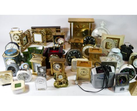 A collection of mantel clocks, traveling alarm clocks and miniature novelty clocks, having manual wind and later quartz movem