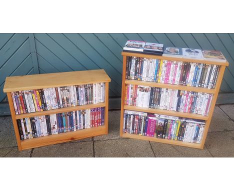 A collection of DVD's, primarily films, over 200 titles, with display shelf units. (2) 