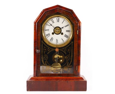 An early 20th century New Haven Clock Co mantel clock, the hexagonal shaped mahogany case opening to an 8 day movement striki