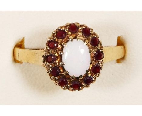 A 9ct gold opal and garnet cluster ring, Q, 2.5gm 