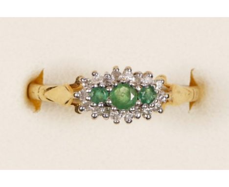 A 9ct gold emerald and diamond cluster ring, P, 1.6gm 