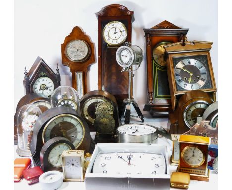 A collection of mid 20th century and later mantel clocks and wall clocks, having manual wind and quartz movements. (3) 