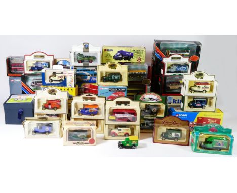 A collection of boxed modern diecast models, to include Corgi Classics - Heavy Haulage, a John Smiths delivery truck set, a W