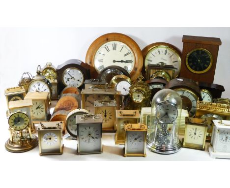 A collection of manual wind and quartz mantel clocks, to include bakelite 8 day examples. (4) 
