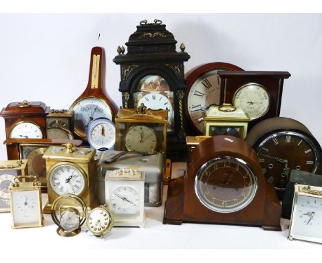 A collection of mantel clocks, wall clocks and barometers, circa 1950s-80s, having manual wind and later quartz movements. (4