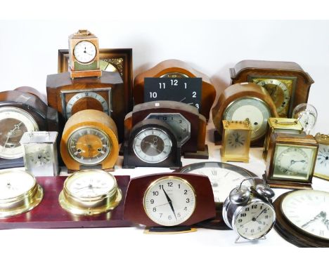 A collection of mid 20th century clocks, to include Bakelite, mahogany and oak cased manual wind examples. (4) 