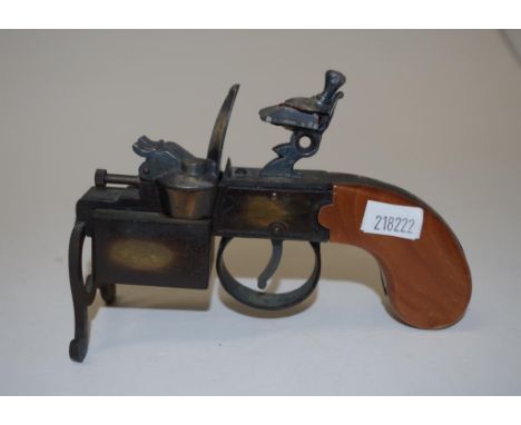 Dunhill 'Tinder Pistol' form cigar lighter marked to base, (length 15cm approx).