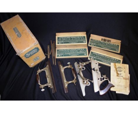 Vintage Stanley Tools USA '55' plane with accessory pieces, and original instruction manual, in original packaging.