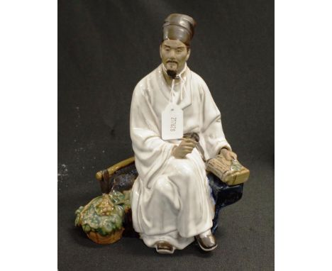 Chinese ceramic seated scribe figure marked to base, (height 24cm approx), on wood stand.