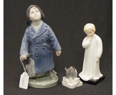 Royal Copenhagen boy in raincoat figure (height 18cm approx); together with a Royal Copenhagen, mouse figure, (height 4cm app
