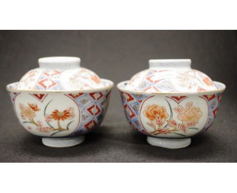 Pair Chinese painted ceramic lidded tea bowls 4 character marks to lids.