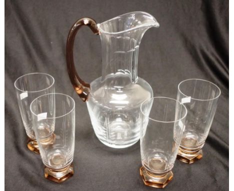 Five piece Orrefors etched glass drink set comprising a jug and 4 glasses, with mauve coloured handle to jug and bases to gla