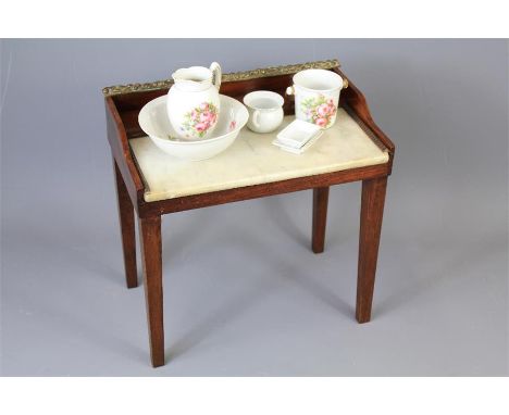 A Miniature Mahogany and White Marble Wash Stand. The stand complete with miniature porcelain wash basin, soap dish, ewer, sl