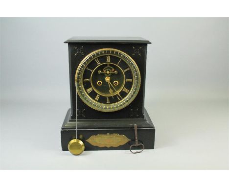 A Slate "Chancellor of Dublin" Mantel Clock. The clock having a black/green and gilt dial with Roman numerals, approx 28 x 17