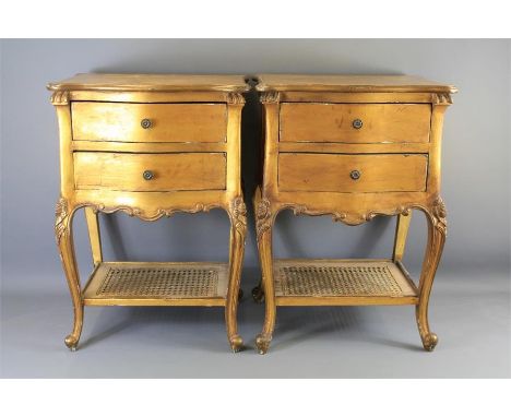 A Pair of French-Style Gold-Painted Side Tables. The tables having two drawers and cane shelf beneath, approx 40 x 48 x 71 cm