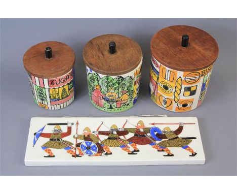 Three Danish Retro 'Jie Gantofta' Storage Jars. The vibrantly decorated and coloured jars with wooden lids and finial,&nbsp; 