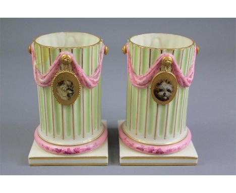 Two Royal Worcester Spill Vases. The vases depicting oval portraits of beloved dogs including two Terriers, Doberman and King
