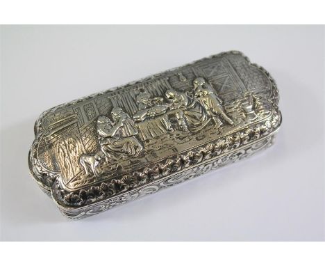 A Continental Silver Trinket Box. The box embossed with an interior scene with figures seated around a table, stamped 925 wit