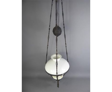 An Antique Victorian Cast Iron Adjustable Hanging (Electrified) Oil Lamp, with glass funnel and milk glass shade, approx 28 c