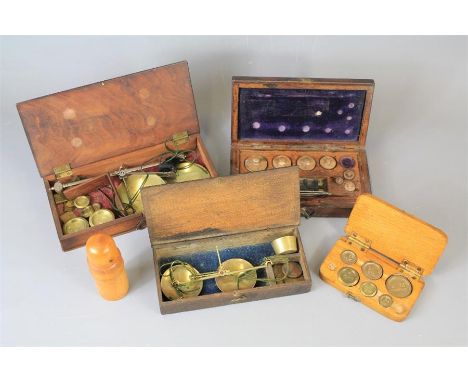 Miscellaneous Items. This lot includes a treen needle case, together with three sets of boxed apothecary scales. (with some w
