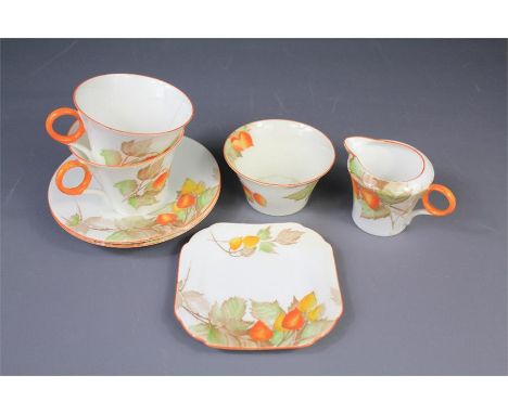 Shelly Porcelain Part Tea Service. The service comprising milk jug, sugar bowl, two tea cups, two saucers and a tea plate.&nb