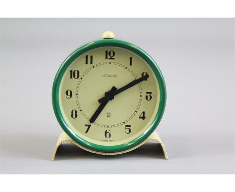 A Vintage Jaeger LeCoultre Military Alarm Clock. The clock with khaki face and numeric dial approx 6 cms.