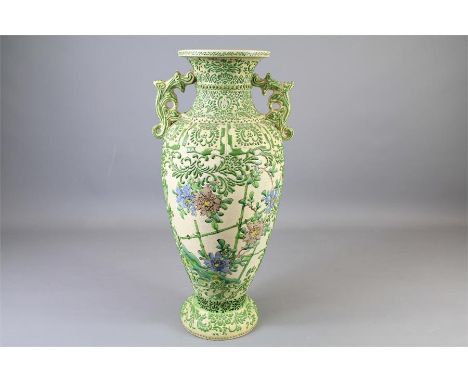 A Large Japanese Satsuma Vase. The vase heightened with green enamel and hand painted with blue peony, approx 45 cms h, with 