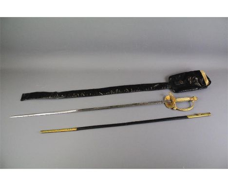 An English Court Sword. The with gilded hilt and bullion knot. Cipher to grip, Wilkinson blade, presented in the original bla