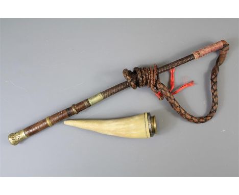 An Antique Hunting Whip and Lash. The plaited leather whip with brass top and un-engraved cartouche and plaited leather lash 