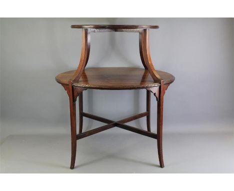 A Mahogany 'Dumb Waiter'. The top shelf with inlay, shelf beneath, splayed legs and feet, approx 56 x 33 x 70 cms.&nbsp;
