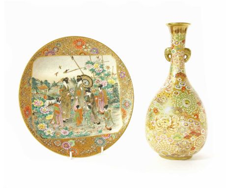 A Satsuma bottle vase, late 19th century, with moulded gilt handles and painted all-over with flowers in enamel and gilt, sig